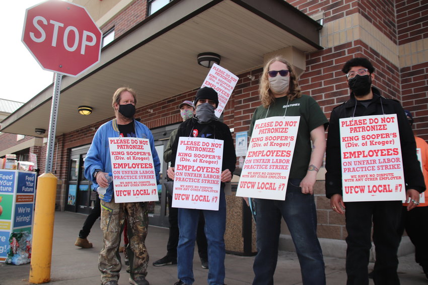 From left to right: Don Hotopp, Wesley Bradley, Dylan Simonson and Carlos Giraldo Pappas strike outside the King Soopers at Littleton Boulevard and South Broadway.